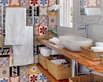 May include: A bathroom with a wooden countertop and a white porcelain sink. The walls are decorated with colorful patterned tiles. There are several wicker baskets on the countertop, some containing towels.