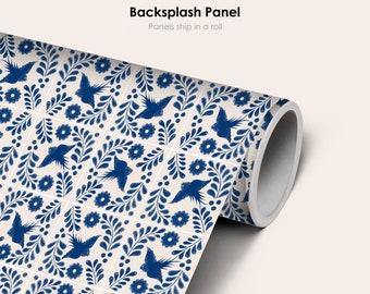 May include: A roll of self-adhesive backsplash tile featuring a blue and white pattern of stylized birds and floral designs. The text "Backsplash Panel" and "Panels ship in a roll" is printed on the label.