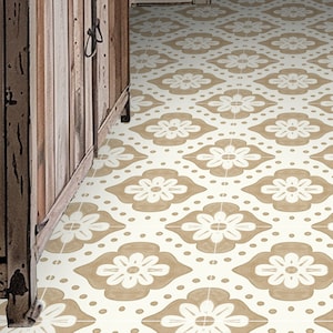 May include: A white floor with a repeating pattern of brown floral tiles. The tiles have a white background with a brown floral design.