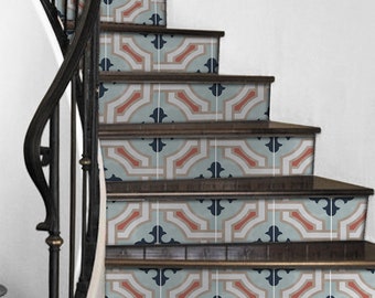 May include: Stair treads with a geometric pattern in shades of blue, pink, and beige. The pattern features a repeating design of interlocking squares and circles.