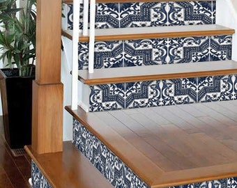 May include: A set of blue and white patterned tile stickers for stairs. The stickers are designed to look like traditional ceramic tiles and feature a geometric pattern with floral accents.
