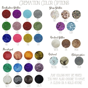 May include: A chart of cremation color options with various glitter and pearlized colors. The chart is divided into sections: Birthstone Glitter, Glass Glitter, Neutral Glitter, Pearlized, Natural, and Holographic. Each section has a variety of colors represented by small circles.