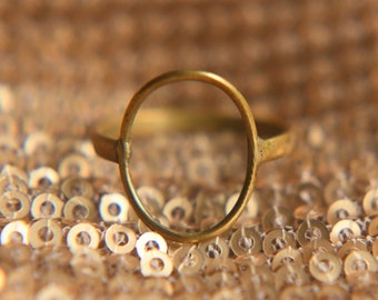 Ring made of brass, oval trinkets, round ring