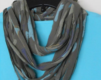 Grey green infinity scarf with turquoise and yellow accents