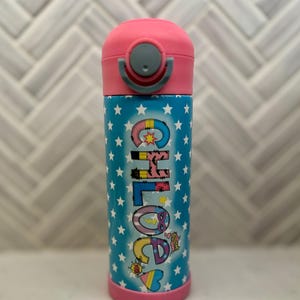 Super girl kids tumbler with lid; leakproof, dishwasher safe, stainless steel, over superhero theme