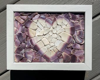 Corazón de mosaico de conchas marinas