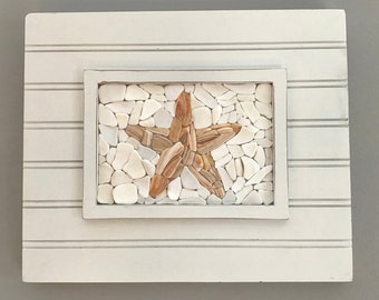 Estrella de mar con mosaico de conchas marinas