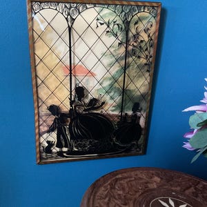 Reverse Painted Black Silhouette Mother Reading to Her Children 1940’s