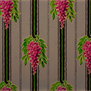 May include: A repeating pattern of pink wisteria flowers with green leaves on a gray and black striped background.
