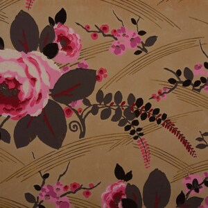 May include: A vintage wallpaper design featuring pink and red roses with dark brown leaves on a beige background. The pattern also includes a repeating design of brown branches with small pink flowers.