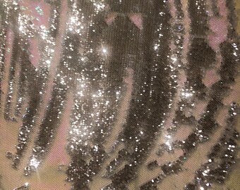 Sparkly Reversible holographic pink/ silver 5 mm sequin fabric . DIY, bows, clothing or backdrop projects. Flip up. 53&quot;wide!