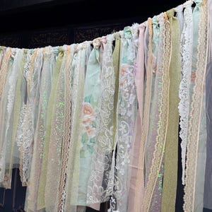 Vintage Simple Shabby Chic Roses Cotton, sequined Ribbons and Lace wedding Garland. Farmhouse rustic vintage curtain backdrop.
