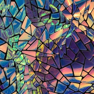 Iridescent holographic Geometric velvet base lace. Big irregular sequins. Unique and luminous . 60”wide. BTY
