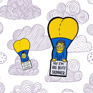 May include: Two cartoon character pins with a yellow heart-shaped bottom and blue shirts. The characters are holding signs that say "Hi! I'm Big Butt Skinner". The pins are on a white background with a pattern of purple clouds.