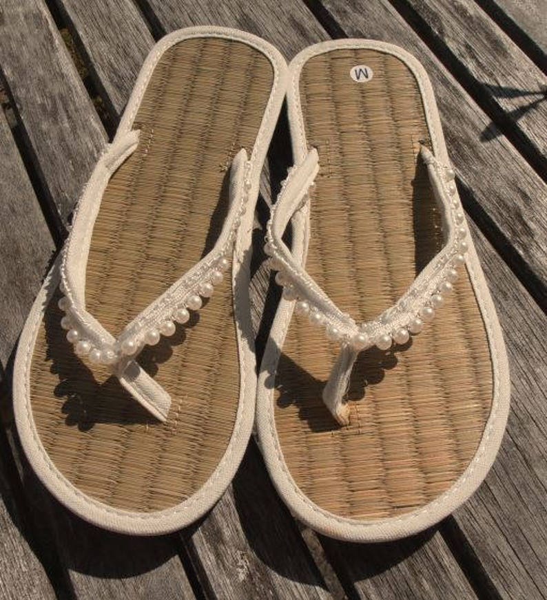 straw sole flip flops