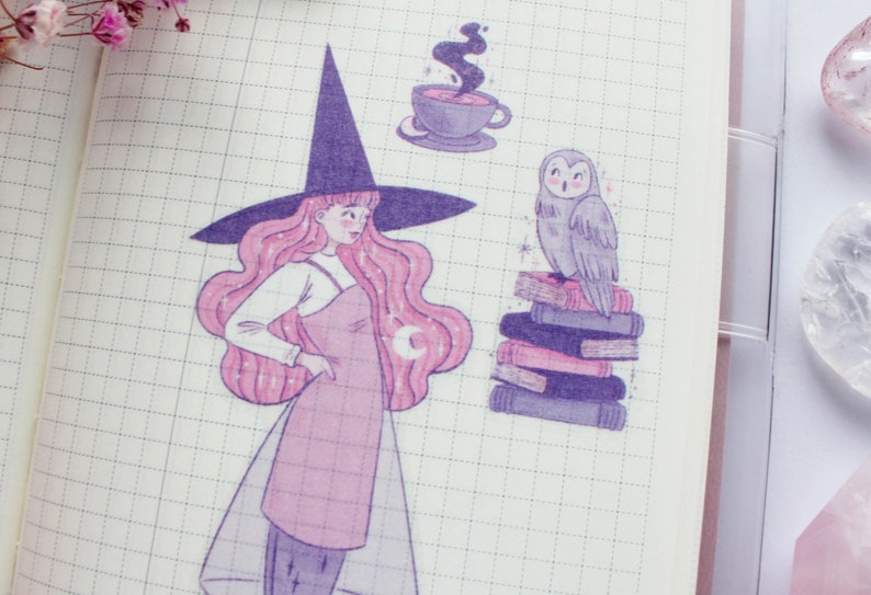 May include: A pink witch with a purple hat and long hair stands on a gridded background. She is holding a wand in her right hand. A gray owl sits on a stack of purple books. A purple cup of tea with steam rising from it is in the upper right corner.