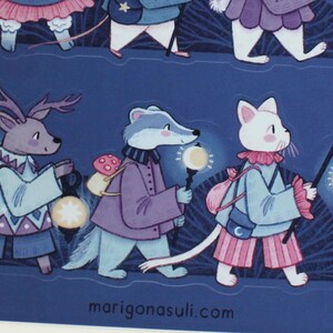 May include: A set of four illustrated stickers featuring a deer, a badger, a cat, and a rabbit. Each animal is carrying a lantern and walking on a blue background with a white star pattern. The text "marigonastuli.com" is at the bottom of the image.