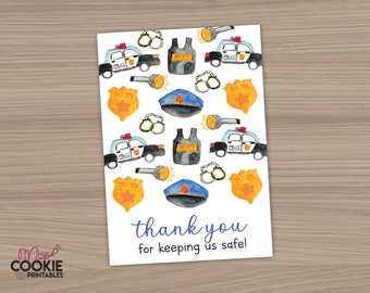 May include: Thank you for keeping us safe! A white card with a blue and yellow watercolour pattern of police cars, badges, handcuffs, flashlights, and hats.