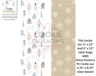 May include: Double-sided rectangular paper backer with two distinct patterns. Side 1 features a white background with pink, blue, and black illustrated Christmas trees. Side 2 features a tan background with white snowflake illustrations.