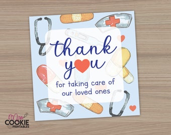 May include: Blue thank you card with a white border and the text "thank you" with a red heart. The card is decorated with medical symbols like a stethoscope, bandages, pills, and a nurse's hat. The text below the heart says "for taking care of our loved ones".