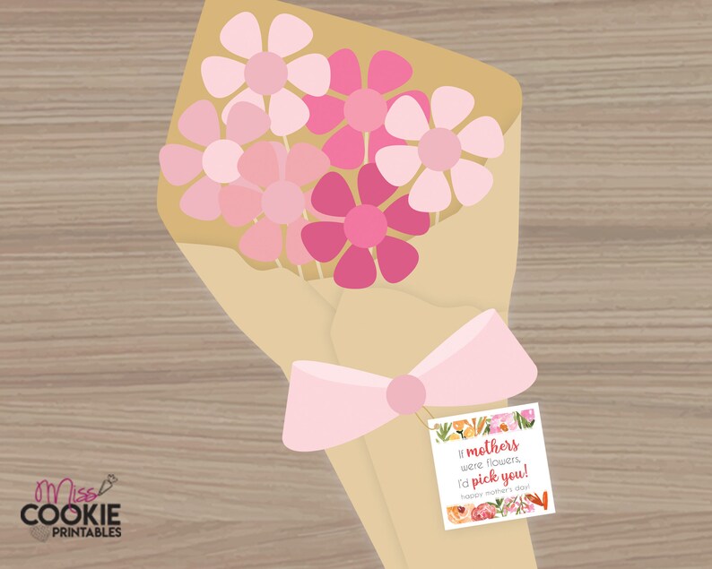 May include: A bouquet of pink and white paper flowers wrapped in brown paper with a pink ribbon and a gift tag that reads "If mothers were flowers, I'd pick you! Happy Mother's Day!"