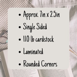 May include: A white cardstock note card with black text. The card is approximately 7 inches by 2.5 inches. The text reads: "Approx. 7in x 2.5in", "Single Sided", "110 lb cardstock", "Laminated", and "Rounded Corners".