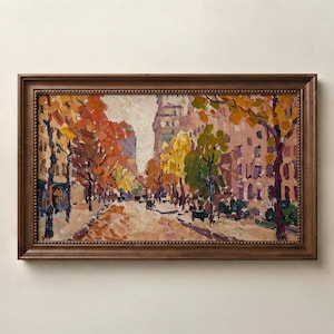 May include: An oil painting in a dark brown wooden frame depicting an urban street scene during autumn. The artwork features thick, textured brushstrokes in shades of orange, yellow, and green, capturing trees lining a city road with buildings.