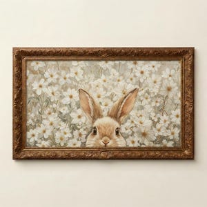 May include: A rectangular wall art piece featuring a painting of a brown rabbit peeking out from a dense field of white flowers. The artwork is enclosed in an ornate, antique-style metallic gold frame with intricate embossed floral detailing.