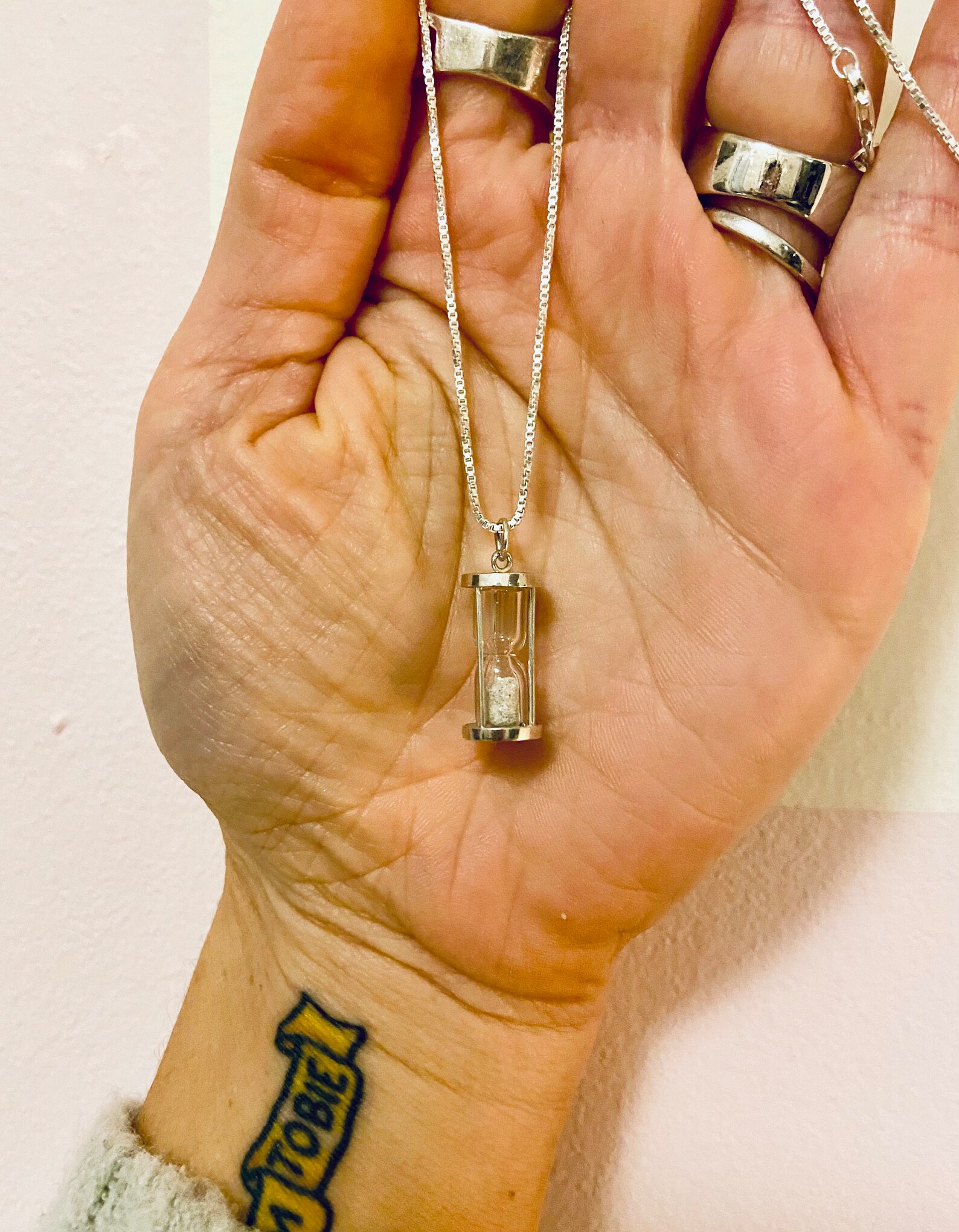 Hourglass Necklace in Sterling Silver With Genuine Diamond Dustgreat