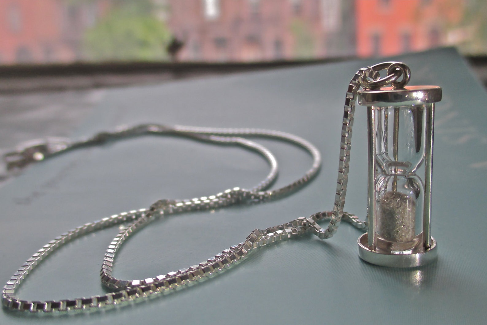 Hourglass Necklace in Sterling Silver With Genuine Diamond Dustgreat