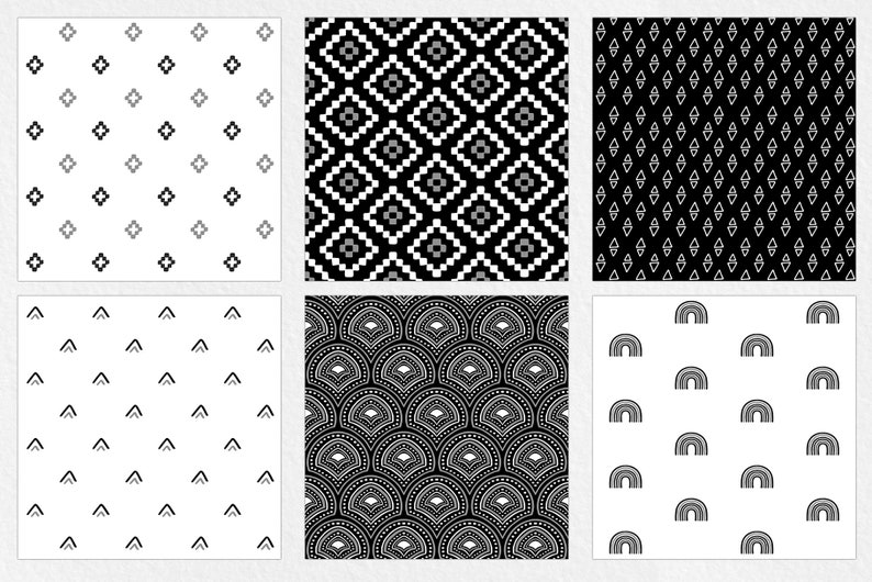 Pu&ograve; includere: Sei diversi motivi geometrici in bianco, nero e grigio. I motivi includono forme a diamante, zigzag e archi ripetuti. I disegni sono adatti per tessuti, carta da parati o sfondi digitali.