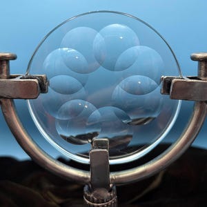 Magiscope Sculpture: Etched Glass Sun Catcher with Bronzed Steel CV Joint Base (Signed "MPV")