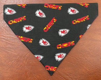 Kansas City Chiefs Pet Bandana. Reversible over the collar Kansas City Chiefs. One side Black KC Chiefs, other side is Red KC and Chiefs