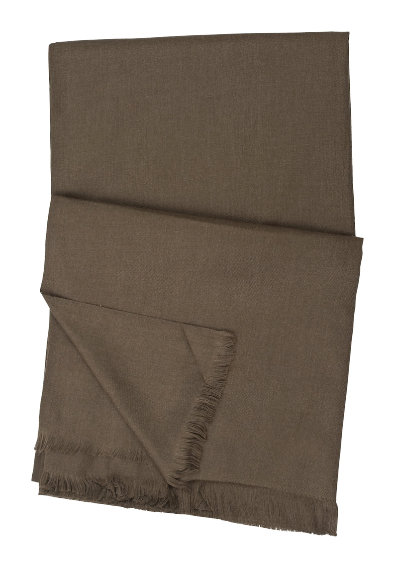 May include: A brown woven scarf with fringed edges.