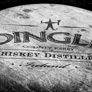 Dingle whiskey barrel wall art print, Irish distillery decor photography from County Kerry in black and white or sepia tones