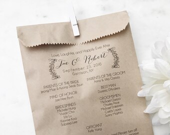 May include: A brown paper bag wedding program held closed with a white clip. The program includes the names of the bride and groom, wedding date, location, wedding party, and a message to guests.