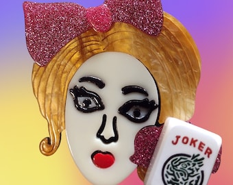 Wide-Eyed Mahjongg Lady Lapel Pin with a Joker Tile