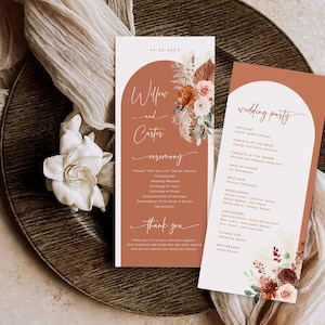 May include: A wedding ceremony programme with a terracotta background and floral illustrations. The programme includes the names "Willow and Carter" and the date "09.28.20XX". The programme lists the order of the ceremony and includes a thank you message to guests. A separate card lists the wedding party members.