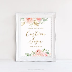 Puede incluir: Un marco blanco con un cartel que dice "Make your own Custom Sign, One 8x10 Sign". El cartel tiene un diseño floral con flores rosas y blancas y detalles dorados.