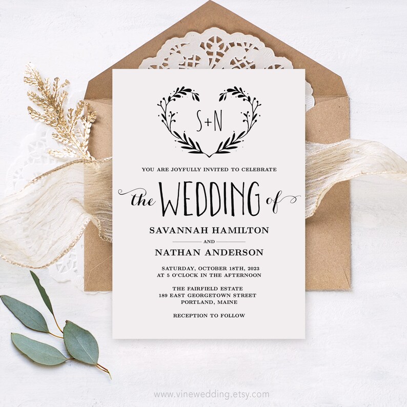 May include: A wedding invitation with a black and white floral heart design featuring the initials "S+N". The text reads "You are joyfully invited to celebrate the wedding of Savannah Hamilton and Nathan Anderson, Saturday, October 18th, 2023 at 5 o'clock in the afternoon, The Fairfield Estate, 189 East Georgetown Street, Portland, Maine, Reception to follow, www.vinewedding.etsy.com".