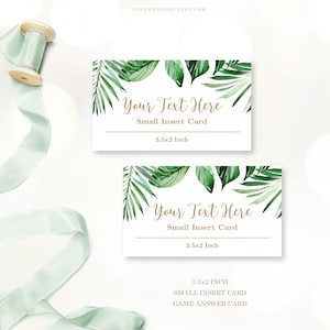 May include: Two white cards with a tropical leaf border and gold text. The text on the cards reads "Your Text Here" and "Small Insert Card". The cards are 3.5 inches by 2 inches.