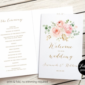 May include: A folded wedding program with a floral design. The front cover features a watercolor illustration of pink roses and greenery with gold accents. The text reads "Welcome to our wedding Savannah & Nathan 08.18.23".
