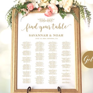 May include: A gold wedding seating chart with a floral design and the text "find your table" at the top. The chart lists the names of guests and their assigned tables. The names Savannah and Noah are listed at the top of the chart, along with the date July 18, 2023 and the location Sonoma, CA.