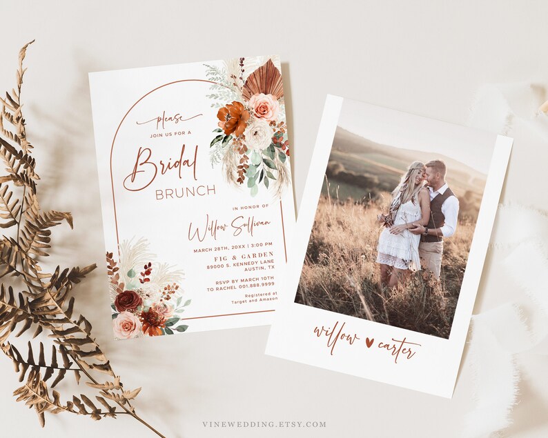 May include: A printable bridal brunch invitation with a boho floral design. The invitation features a watercolor illustration of flowers, pampas grass, and a terracotta arch. The text reads "Please join us for a Bridal Brunch in honor of Willow Sofian, March 28th, 20XX, 3:00 PM, Fig & Garden, 8900 S. Kennedy Lane, Austin, TX. RSVP by March 10th to Rachel (555) 555-5555. Registered at Target and Amazon."