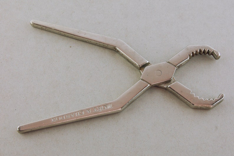 2 Mo\u00ebt et Chandon Bottle Openers Vintage Advertising Barware Champagne Cork Removers