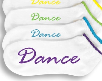 May include: Six pairs of white ankle socks with a colorful trim and the word "Dance" embroidered on each sock in a cursive font.