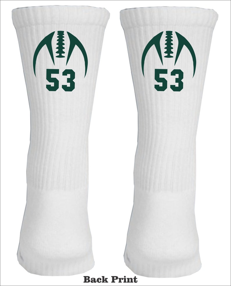 May include: White athletic socks with a green football graphic and the number 53 on the front.