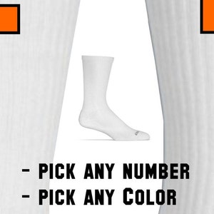May include: White crew socks with a ribbed texture. - PICK ANY NUMBER - PICK ANY COLOR
