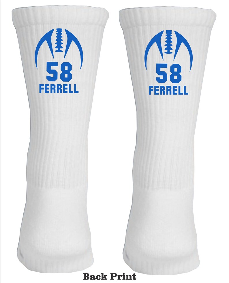 May include: White athletic socks with a blue football graphic and the number 58 and the name Ferrell printed on them.