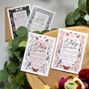 May include: Two baby shower invitations featuring a floral design. The invitations are pink and white with butterflies and flowers. The text on the invitations reads "Jessica's Baby Shower" and includes the date, time, and location of the event.